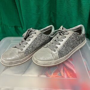 Silver tennis shoes